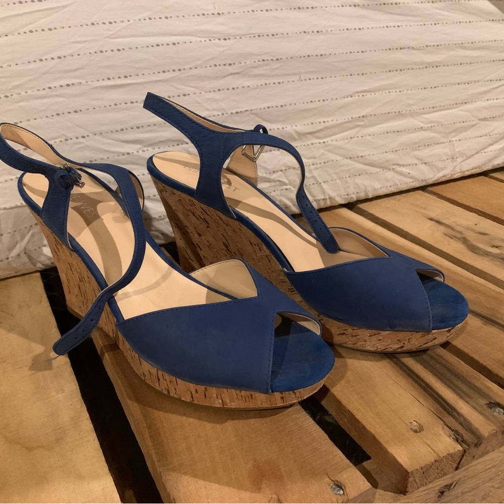 Royal blue Nine West wedges. Worn once. Like new, just a little dusty. Size 8M.